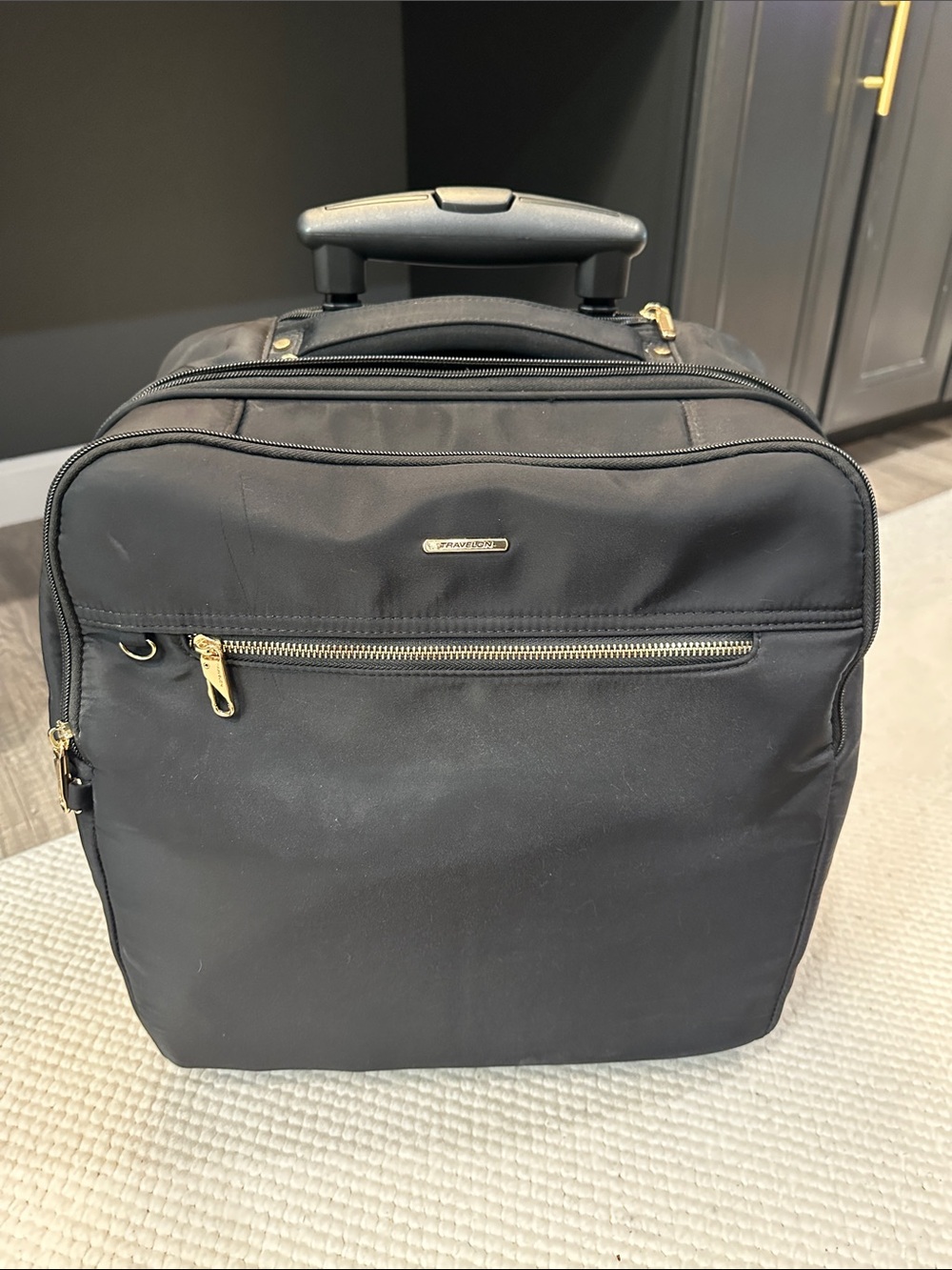 Travelon Black Rolling Business Carry-On with Gold Accents